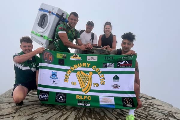 Tommy Dunford and supporters at the summit of Snowdon.