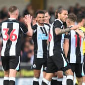 Jacob Murphy of Newcastle celebrates scoring to make it 1-0 with team mates during the pre-season friendly between Burton Albion and Newcastle United at the Pirelli Stadium on July 30, 2021 in Burton-upon-Trent, England.