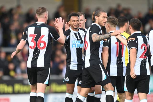 <p>Jacob Murphy of Newcastle celebrates scoring to make it 1-0 with team mates during the pre-season friendly between Burton Albion and Newcastle United at the Pirelli Stadium on July 30, 2021 in Burton-upon-Trent, England.</p>