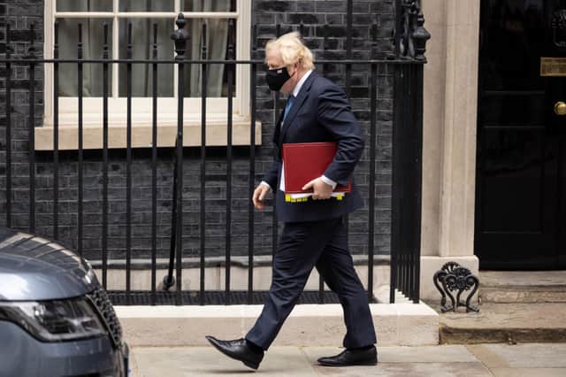 UK Prime Minister Boris Johnson leaves Downing Street to attend the weekly Prime Ministers Questions in Parliament on July 14, 2021 in London, England.