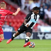 Allan Saint-Maximin of Newcastle United runs with the ball during the Pre-Season Friendly match between Doncaster Rovers and Newcastle United at at Keepmoat Stadium on July 23, 2021 in Doncaster, England. 