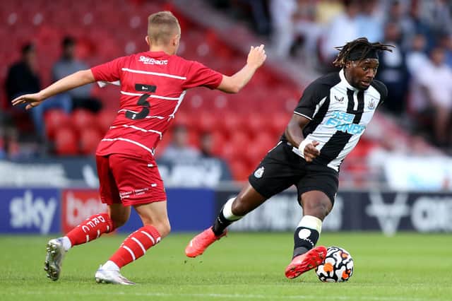 Allan Saint-Maximin of Newcastle United runs with the ball during the Pre-Season Friendly match between Doncaster Rovers and Newcastle United at at Keepmoat Stadium on July 23, 2021 in Doncaster, England. 