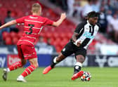 Allan Saint-Maximin of Newcastle United runs with the ball during the Pre-Season Friendly match between Doncaster Rovers and Newcastle United at at Keepmoat Stadium on July 23, 2021 in Doncaster, England. 