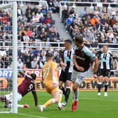 Freddie Woodman of Newcastle United fails to save a shot leading to the first goal of West Ham United during the Premier League match between Newcastle United and West Ham United at St. James Park on August 15, 2021 in Newcastle upon Tyne, England.