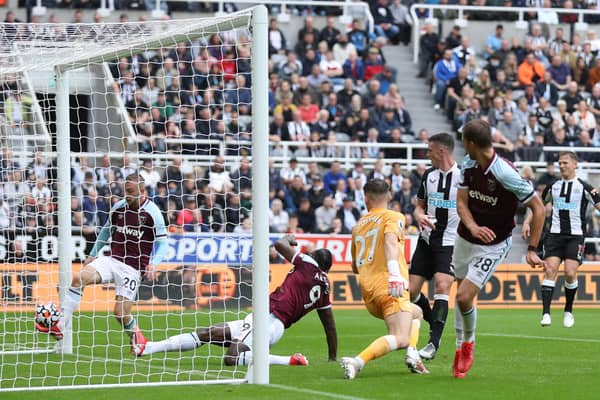 Freddie Woodman of Newcastle United fails to save a shot leading to the first goal of West Ham United during the Premier League match between Newcastle United and West Ham United at St. James Park on August 15, 2021 in Newcastle upon Tyne, England.