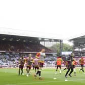 Players of Newcastle United warm up prior to the Premier League match between Aston Villa and Newcastle United at Villa Park on August 21, 2021 in Birmingham, England.
