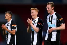 Matty Longstaff of Newcastle United applauds the fans after the Pre-Season Friendly match between Doncaster Rovers and Newcastle United at at Keepmoat Stadium on July 23, 2021 in Doncaster, England.