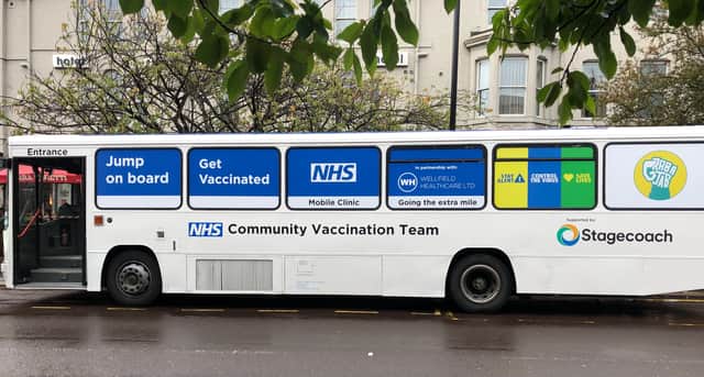An NHS mobile vaccination clinic in Newcastle. The vaccine roll-out has now reached under-18s as schools prepare to return across England. Credit Shutterstock