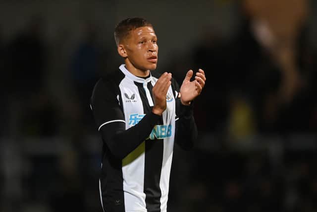 Dwight Gayle of Newcastle in action during the pre-season friendly between Burton Albion and Newcastle United at the Pirelli Stadium on July 30, 2021 in Burton-upon-Trent, England.