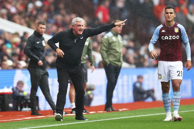Steve Bruce, Manager of Newcastle United gives instructions during the Premier League match between Aston Villa and Newcastle United at Villa Park on August 21, 2021 in Birmingham, England.