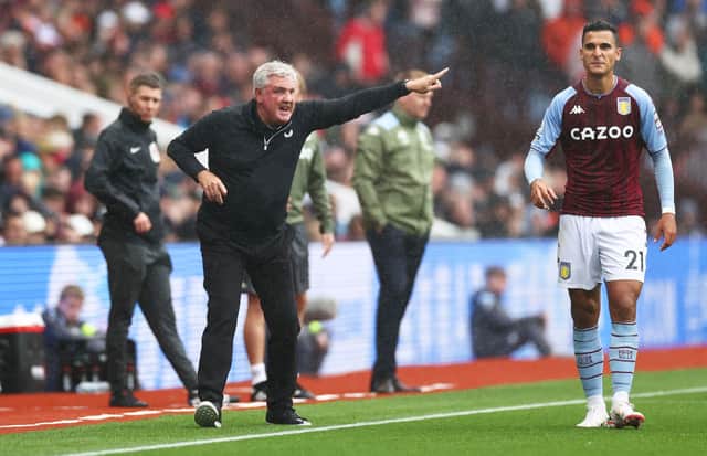 Steve Bruce, Manager of Newcastle United gives instructions during the Premier League match between Aston Villa and Newcastle United at Villa Park on August 21, 2021 in Birmingham, England.
