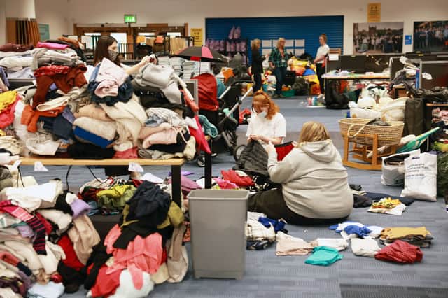 Volunteers sorting through donations to support Afghan refugees, at the NEST collection hub at Newcastle University. Photo: NCJ Media.