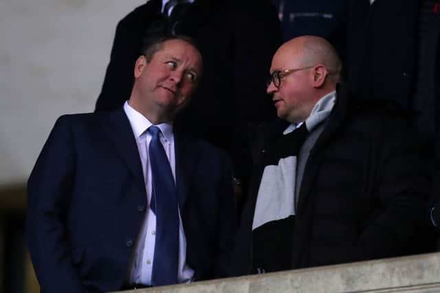 Mike Ashley owner of Newcastle United talks to managing Directory Lee Charnley ahead of the FA Cup Fourth Round Replay match between Oxford United and Newcastle United at Kassam Stadium on February 04, 2020 in Oxford, England.