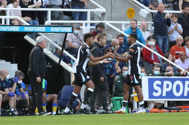 <p>Callum Wilson of Newcastle United is substituted off as Joelinton of Newcastle United is substituted on during the Premier League match between Newcastle United  and  Southampton at St. James Park on August 28, 2021 in Newcastle upon Tyne, England. </p>