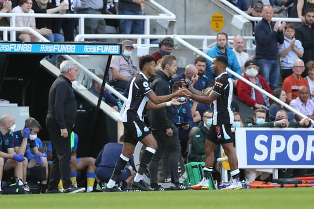 <p>Callum Wilson of Newcastle United is substituted off as Joelinton of Newcastle United is substituted on during the Premier League match between Newcastle United and Southampton at St. James Park on August 28, 2021 in Newcastle upon Tyne, England. </p>