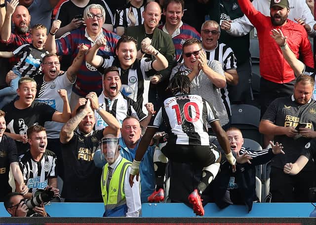 Allan Saint-Maximin of Newcastle United scores his teams second goal during the Premier League match between Newcastle United and Southampton at St. James Park on August 28, 2021 in Newcastle upon Tyne, England.
