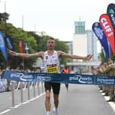 Great North Run 2021 mens race winner Marc Scott crossing the finish line (Kevin Brady)