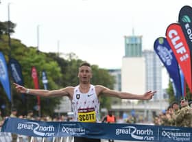 Great North Run 2021 mens race winner Marc Scott crossing the finish line (Kevin Brady)