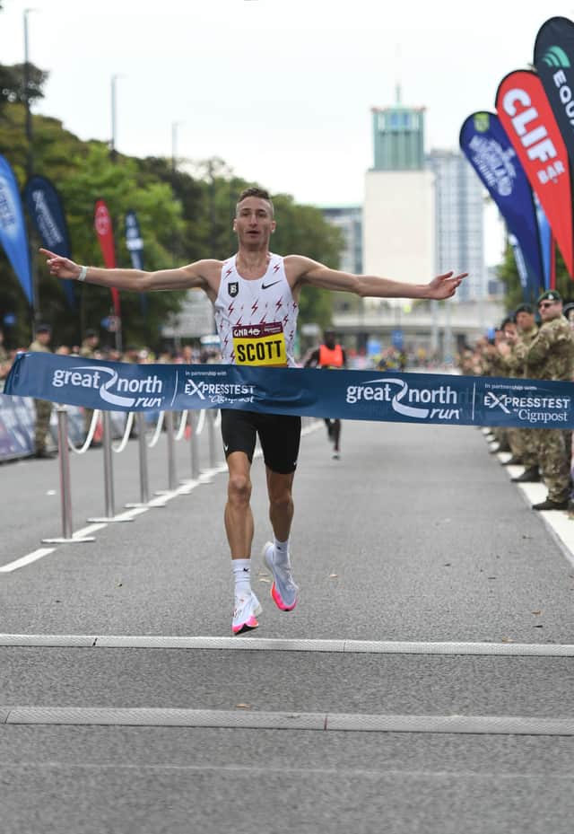 Great North Run 2021 mens race winner Marc Scott crossing the finish line (Kevin Brady)