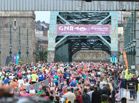 Runners make their way across the iconic Tyne Bridge