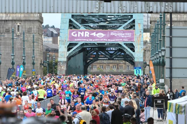 Runners cross the iconic Tyne Bridge