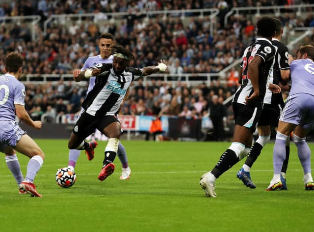Allan Saint-Maximin of Newcastle United  scores their team’s first goal  during the Premier League match between Newcastle United and Leeds United at St. James Park on September 17, 2021 in Newcastle upon Tyne, England. (Photo by Ian MacNicol/Getty Images)