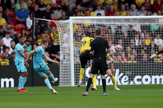 Sean Longstaff of Newcastle United scores their team’s first goal   during the Premier League match between Watford and Newcastle United at Vicarage Road on September 25, 2021 in Watford, England. 
