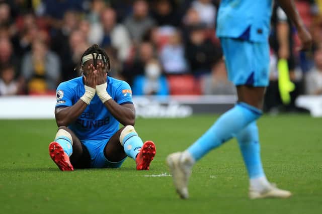 Allan Saint-Maximin of Newcastle United looks dejected after the Premier League match between Watford and Newcastle United at Vicarage Road on September 25, 2021 in Watford, England.
