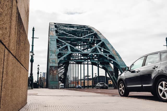 Newcastle upon Tyne UK 21st March 2021: Low angle street view of a rusty Tyne bridge in Newcastle city