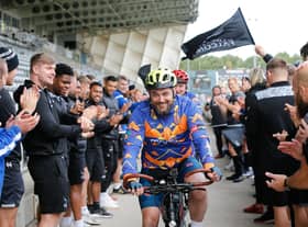 Newcastle Falcons players cheer off Matt and Mark as they depart Kingston Park Stadium.