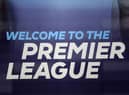 The logo is pictured through a glass window at the headquarters of the English Premier League in London on March 13, 2020. 