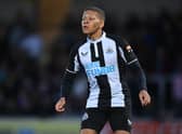 Dwight Gayle of Newcastle in action during the pre-season friendly between Burton Albion and Newcastle United at the Pirelli Stadium on July 30, 2021 in Burton-upon-Trent, England.
