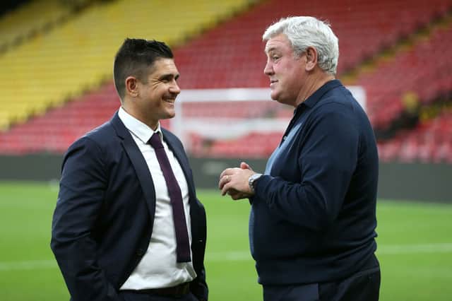 Xisco, Manager of Watford FC with Steve Bruce, Manager of Newcastle United after the Premier League match between Watford and Newcastle United at Vicarage Road on September 25, 2021 in Watford, England.