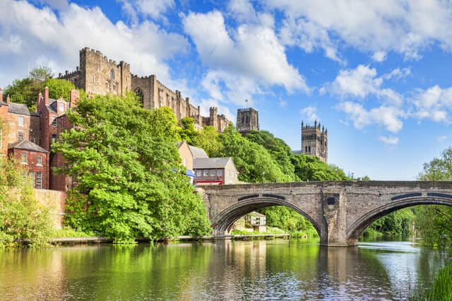 <p>Durham Castle and Cathedral on their rock above the city, and Framwellgate Bridge spanning the River Wear, England, UK</p>