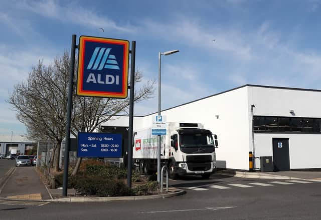 A lorry delivers to an Aldi supermarket (Pic from Getty Images)