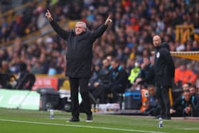 Steve Bruce, Manager of Newcastle United gives their team instructions during the Premier League match between Wolverhampton Wanderers and Newcastle United at Molineux on October 02, 2021 in Wolverhampton, England.