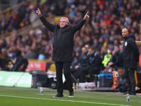 Steve Bruce, Manager of Newcastle United gives their team instructions during the Premier League match between Wolverhampton Wanderers and Newcastle United at Molineux on October 02, 2021 in Wolverhampton, England.