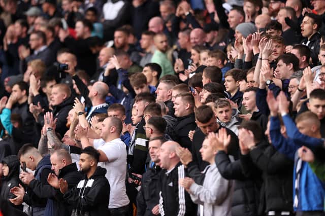Newcastle United fans show their support prior to the Premier League match between Wolverhampton Wanderers and Newcastle United at Molineux on October 02, 2021 in Wolverhampton, England. (Photo by Naomi Baker/Getty Images)