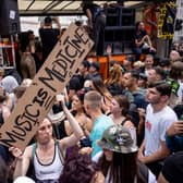 People dancing to a DJ playing on a mobile soundsystem in Piccadilly Circus during a #FreedomToDance protest on June 27, 2021 in London, England. (Photo by Rob Pinney/Getty Images)