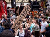People dancing to a DJ playing on a mobile soundsystem in Piccadilly Circus during a #FreedomToDance protest on June 27, 2021 in London, England. (Photo by Rob Pinney/Getty Images)