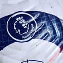 A logo is pictured on a new Nike Flight ball during the English Premier League football match between Brighton and Hove Albion and Crystal Palace at the American Express Community Stadium in Brighton, southern England on February 22, 2021.