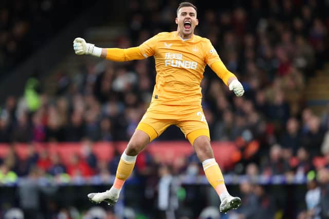 Karl Darlow of Newcastle United celebrates after their side’s first goal scored by Callum Wilson (Not pictured) during the Premier League match between Crystal Palace and Newcastle United at Selhurst Park on October 23, 2021 in London, England.