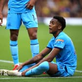 Joe Willock of Newcastle United reacts during the Premier League match between Watford and Newcastle United at Vicarage Road on September 25, 2021 in Watford, England.