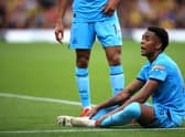 Joe Willock of Newcastle United reacts during the Premier League match between Watford and Newcastle United at Vicarage Road on September 25, 2021 in Watford, England.