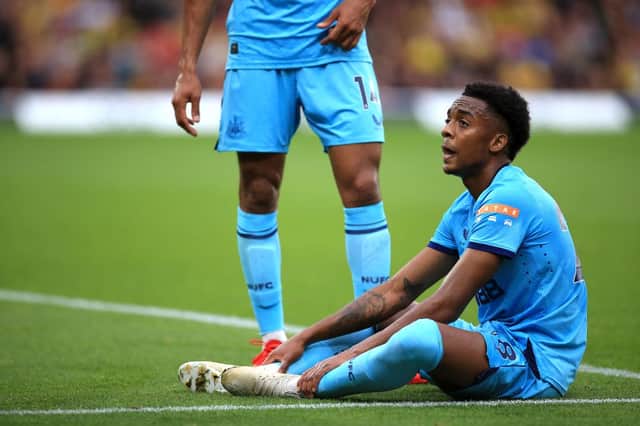 <p>Joe Willock of Newcastle United reacts during the Premier League match between Watford and Newcastle United at Vicarage Road on September 25, 2021 in Watford, England.</p>
