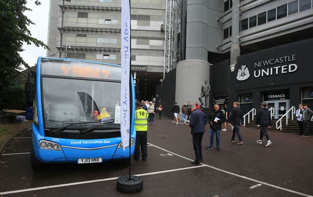 A Covid vaccination bus outside St. James’ Park (Image: Getty Images)
