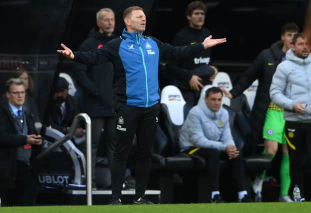 Assistant Head Coach Graeme Jones reacts from the technical area during the Premier League match between Newcastle United and Chelsea at St. James Park on October 30, 2021 in Newcastle upon Tyne, England.