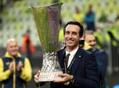 Unai Emery, Head Coach of Villarreal CF celebrates with the UEFA Europa League Trophy following victory in the UEFA Europa League Final between Villarreal CF and Manchester United at Gdansk Arena on May 26, 2021 in Gdansk, Poland. 