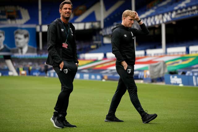 Eddie Howe, Manager of AFC Bournemouth and Jason Tindall, Assistant Manager of AFC Bournemouth inspect the pitch prior to the Premier League match between Everton FC and AFC Bournemouth at Goodison Park on July 26, 2020 in Liverpool, England.