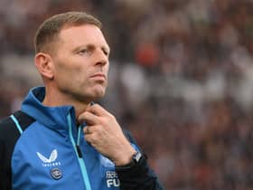 Interim manager Graeme Jones looks on from the technical area before the Premier League match between Newcastle United and Chelsea at St. James Park on October 30, 2021 in Newcastle upon Tyne, England. 